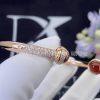 Custom Jewelry Piaget Possession open bangle bracelet in 18K rose gold set with diamonds and carnelian G36PE200